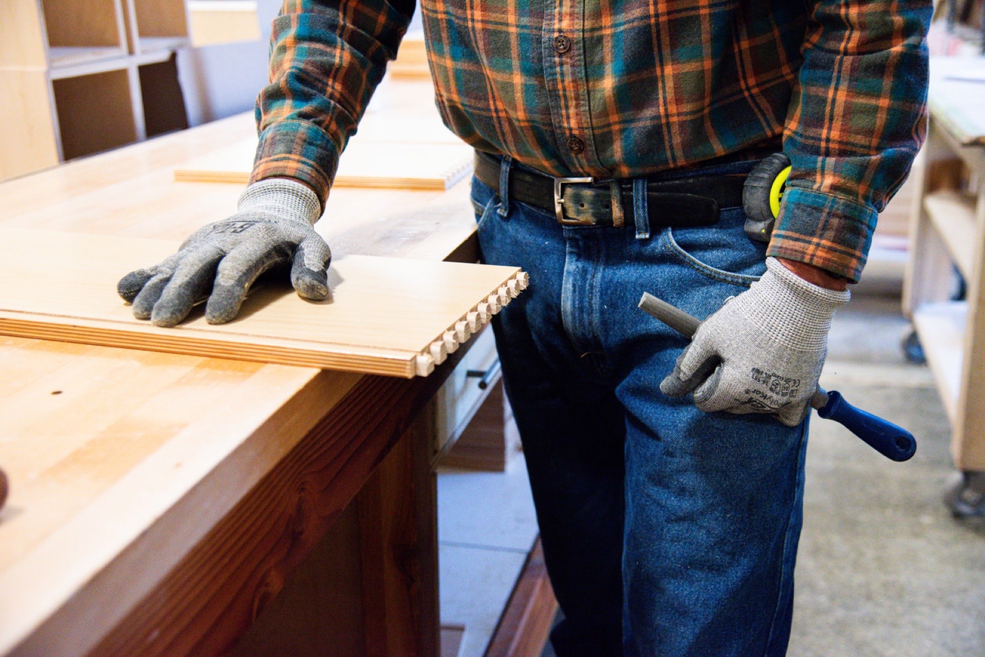 Carpenter fitting a hand-cut joint