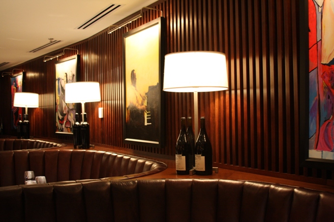 Cameron&rsquo;s Steakhouse interior with custom booth seating and bar millwork