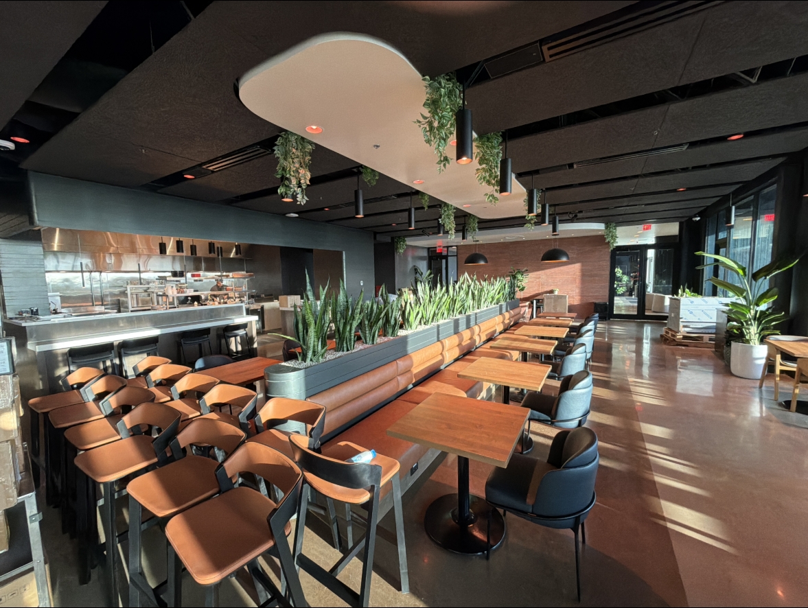 SpaceX dining tables, banquettes, and planter millwork